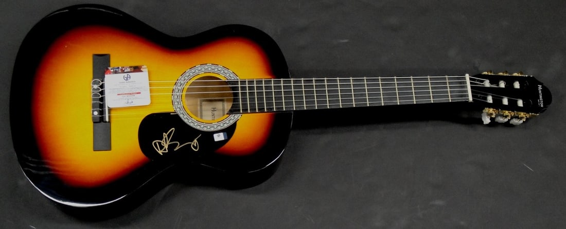 Dave Stewart Autographed Acoustic Guitar Eurythmics GAI Certified: Dave Stewart Autographed Acoustic Guitar Eurythmics GAI Certified This is an authentic acoustic guitar signed by Dave Stewart, renowned member of the Eurythmics. The guitar is a genuine original, acco