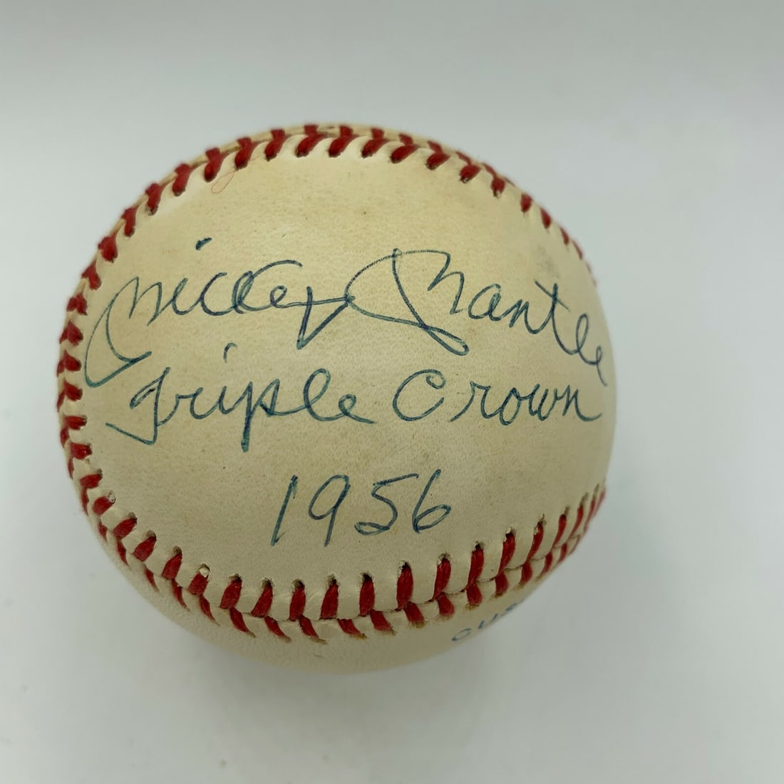 Rare Mickey Mantle Triple Crown 1956 Signed Baseball JSA COA: Rare Mickey Mantle Triple Crown 1956 Signed Baseball JSA COA This is a remarkable Mickey Mantle signed baseball, featuring the inscription "Triple Crown 1956" on an Official American League Baseball. 