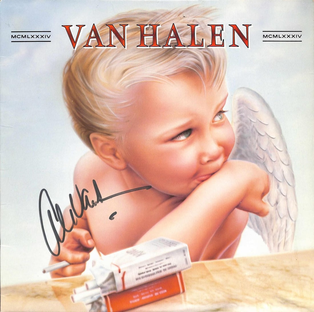 Beckett authenticated Alex Van Halen autographed 1984 album cover: Beckett authenticated Alex Van Halen autographed 1984 album cover Signed Van Halen "1984" album cover autographed by drummer Alex Van Halen in silver paint pen. The album features the iconic baby ange