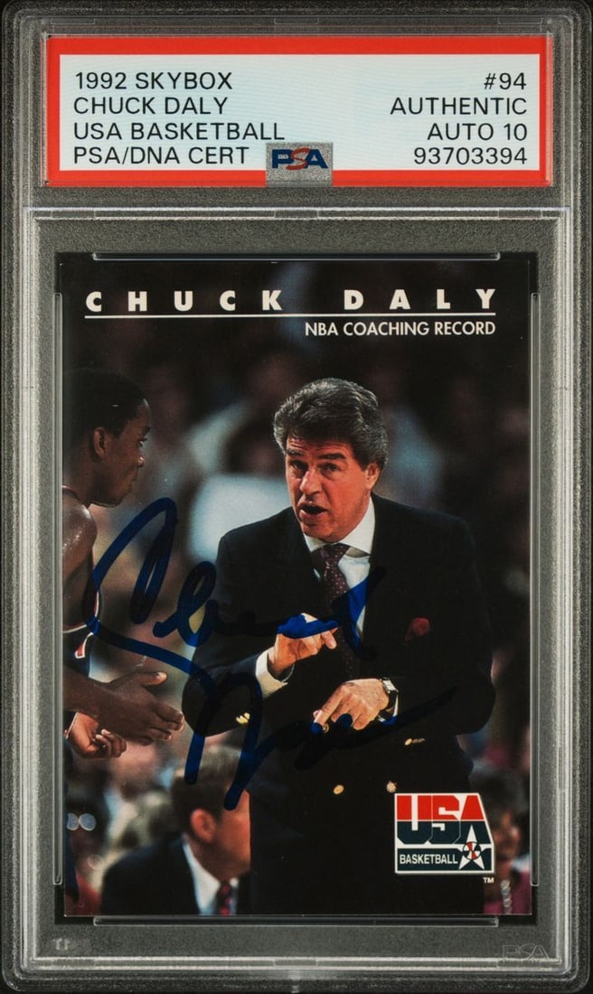 1992 Skybox USA Basketball #94 Chuck Daly Signed Card PSA Authenticated: 1992 Skybox USA Basketball #94 Chuck Daly Signed Card PSA Authenticated This is a 1992 Skybox USA Basketball #94 autographed trading card featuring Chuck Daly. The card is a standard size and showcase