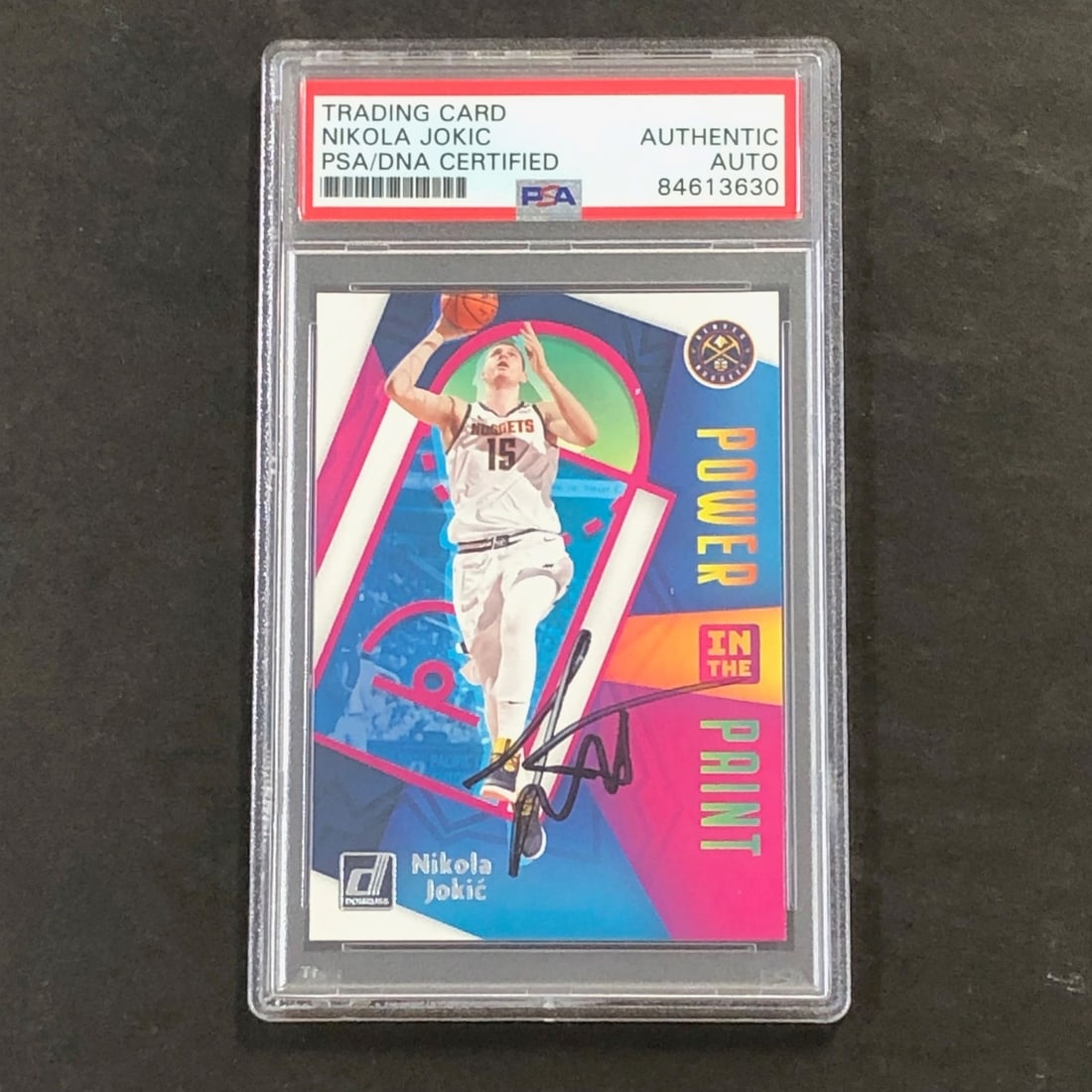 Nikola Jokic PSA DNA autographed Donruss Power in the Paint card: Nikola Jokic PSA DNA autographed Donruss Power in the Paint card This is an original 2020-21 Donruss Power in the Paint #2 basketball trading card featuring Nikola Jokic of the Denver Nuggets. The car