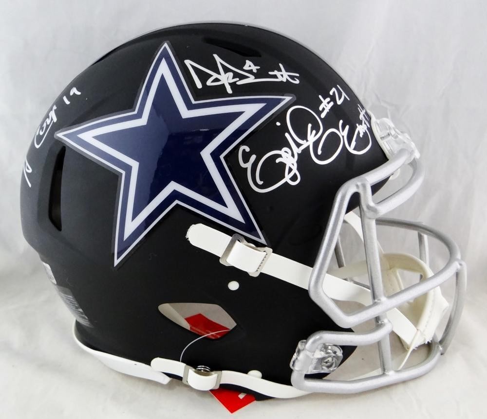 Dallas Cowboys flat black authentic helmet signed by Prescott Cooper Elliott Beckett: Dallas Cowboys flat black authentic helmet signed by Prescott Cooper Elliott Beckett This Dallas Cowboys flat black authentic helmet is signed by Dak Prescott, Amari Cooper, and Ezekiel Elliott. The a