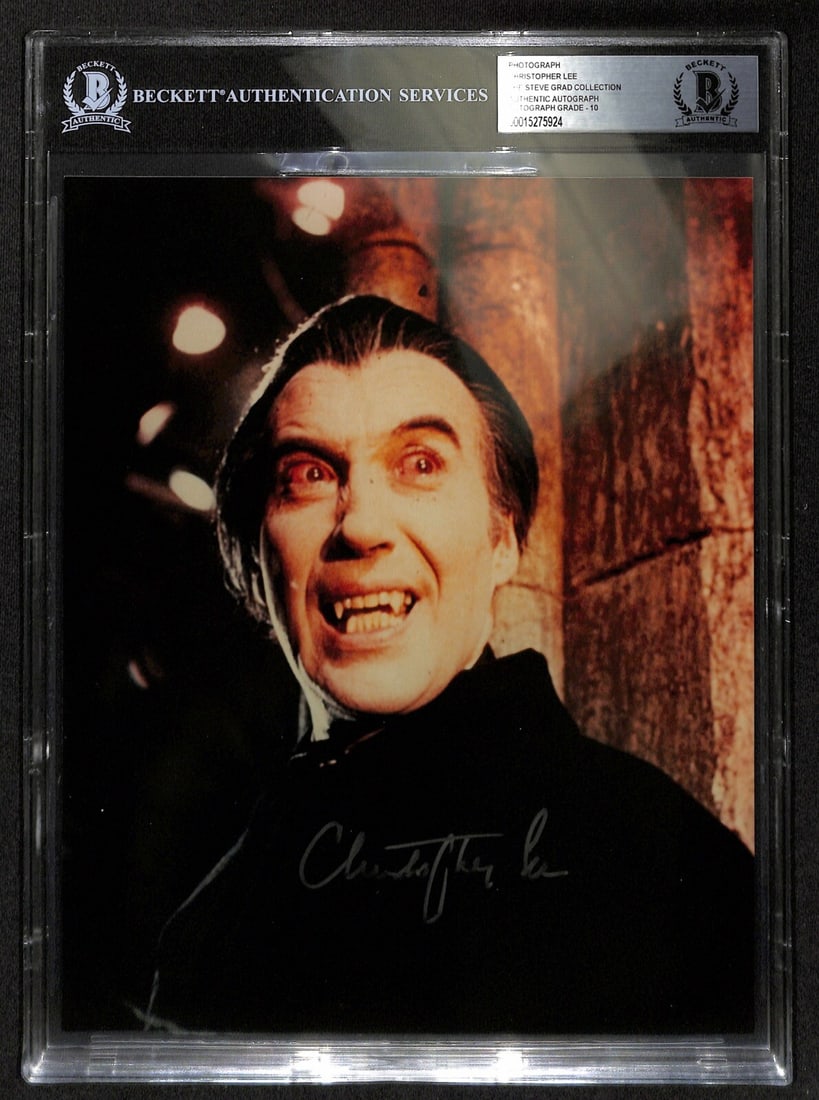 Christopher Lee Autographed Dracula 8x10 Photo Beckett Graded 10: Christopher Lee Autographed Dracula 8x10 Photo Beckett Graded 10 This is an original 8x10-inch color photograph signed by Christopher Lee as Dracula. The autograph, executed in silver paint pen, was o