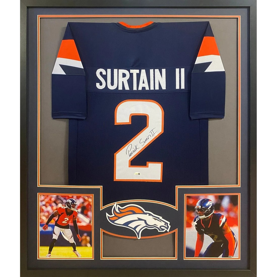 Framed Patrick Surtain Denver Broncos Jersey Signed with JSA Authentication: Framed Patrick Surtain Denver Broncos Jersey Signed with JSA Authentication This framed Denver Broncos jersey is autographed by Patrick Surtain and authenticated by JSA. The display features UV-protec