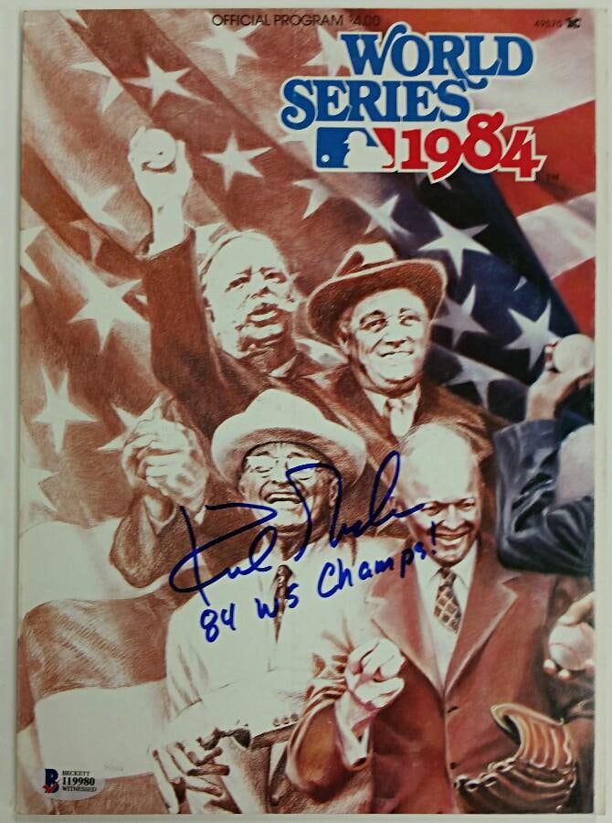 Kirk Gibson Autographed 1984 Tigers World Series Program Beckett Authenticated: Kirk Gibson Autographed 1984 Tigers World Series Program Beckett Authenticated This is an original 1984 World Series program, signed by Kirk Gibson with the inscription '84 Champs.' The autograph is a