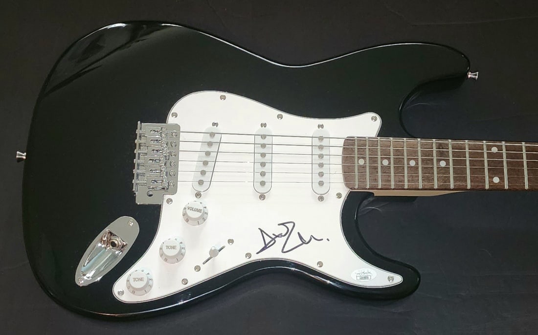 Avril Lavigne Autographed Electric Guitar JSA Certified Rock Star: Avril Lavigne Autographed Electric Guitar JSA Certified Rock Star This is an authentic electric guitar hand-signed by Avril Lavigne, a renowned rock star. The autograph has been verified by James Spen