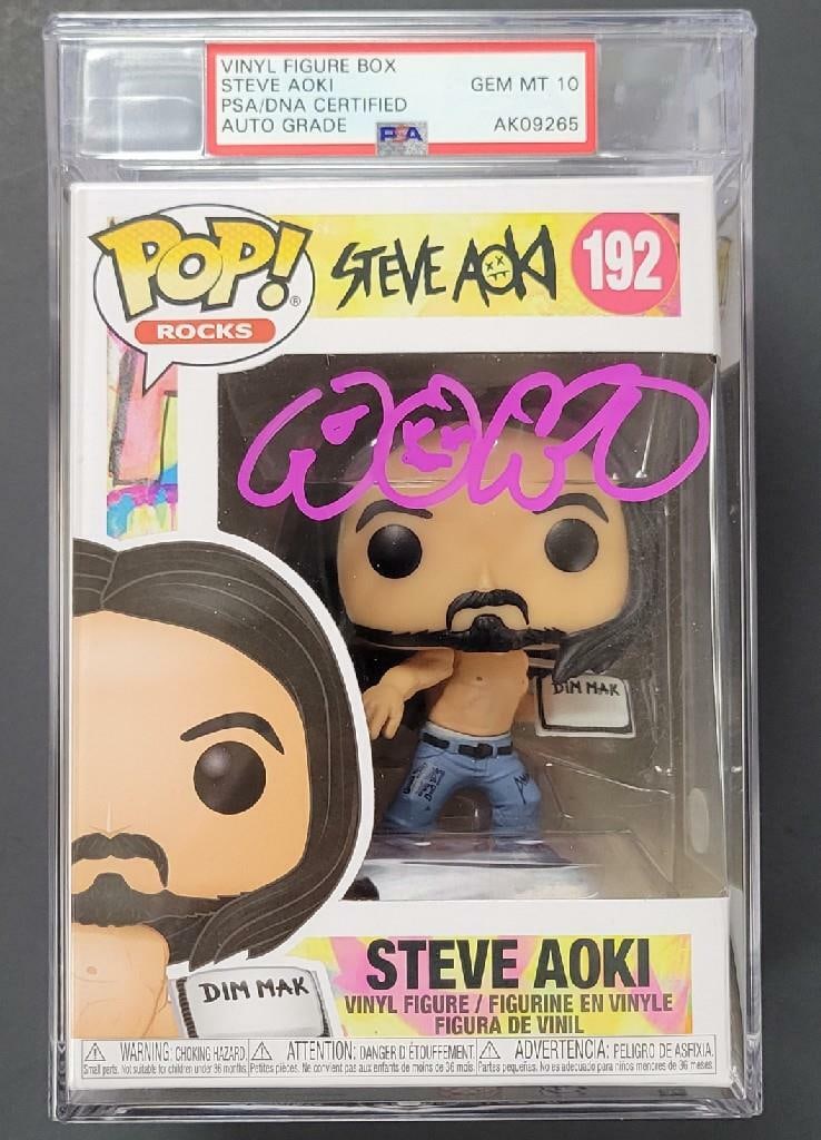 Funko POP DJ Dim Mak Signed by Steve Aoki PSA Gem Mint 10: Funko POP DJ Dim Mak Signed by Steve Aoki PSA Gem Mint 10 This is an original Funko POP featuring DJ Dim Mak, autographed by Steve Aoki. The signature has been authenticated by PSA/DNA and the item is
