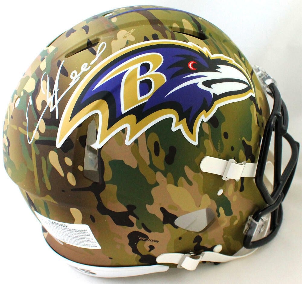 Beckett Authenticated Ed Reed Baltimore Ravens Camo Full Size Helmet: Beckett Authenticated Ed Reed Baltimore Ravens Camo Full Size Helmet This is an original Baltimore Ravens full-size camo Speed Authentic helmet signed by Ed Reed. It is a pre-owned item with Beckett W