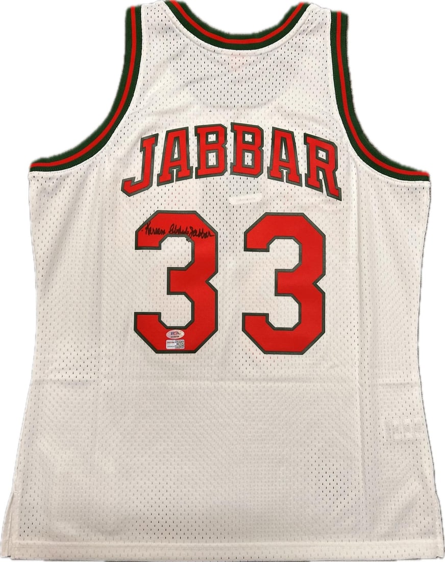 Kareem Abdul-Jabbar PSA DNA autographed Milwaukee Bucks jersey: Kareem Abdul-Jabbar PSA DNA autographed Milwaukee Bucks jersey This is a pre-owned basketball jersey autographed by Kareem Abdul-Jabbar, who played for the Los Angeles Lakers and Milwaukee Bucks. The 
