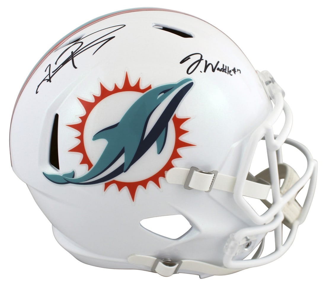 Miami Dolphins full size speed replica helmet signed by Tua Tagovailoa Jaylen Waddle: Miami Dolphins full size speed replica helmet signed by Tua Tagovailoa Jaylen Waddle Autographed full size Speed replica helmet signed by Tua Tagovailoa and Jaylen Waddle of the Miami Dolphins. This o