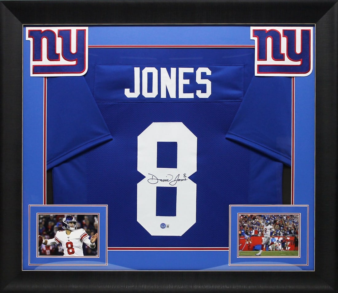Framed Blue Pro Style Jersey Signed by Daniel Jones Beckett Witnessed: Framed Blue Pro Style Jersey Signed by Daniel Jones Beckett Witnessed This autographed blue pro style framed jersey has been personally signed by Daniel Jones of the New York Giants. It is an original
