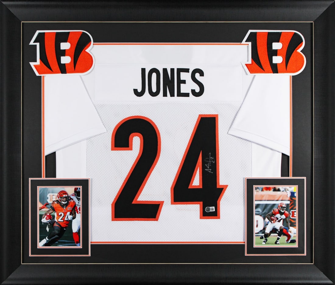 Framed White Pro Style Jersey Signed by Adam Pacman Jones BAS: Framed White Pro Style Jersey Signed by Adam Pacman Jones BAS Autographed white pro style framed jersey personally signed by Adam "Pacman" Jones of the Cincinnati Bengals. The item is original and has
