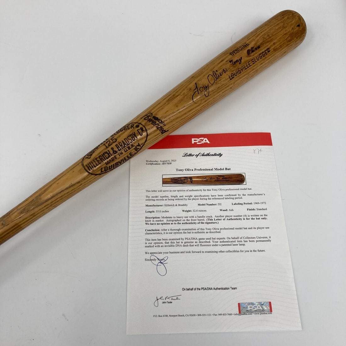 Tony Oliva 1969 Game Used Baseball Bat Signed PSA COA: Tony Oliva 1969 Game Used Baseball Bat Signed PSA COA This is a game-used baseball bat from 1969, signed by Tony Oliva, a legendary player of the Minnesota Twins. The bat is a Louisville Slugger, auth
