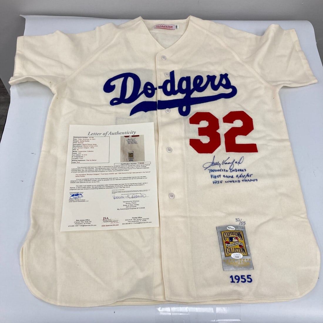 Sandy Koufax Signed Mitchell & Ness Dodgers Jersey JSA COA 1955 Champs: Sandy Koufax Signed Mitchell & Ness Dodgers Jersey JSA COA 1955 Champs Celebrate the legacy of Sandy Koufax with this authentic Mitchell & Ness Brooklyn Dodgers jersey, signed and heavily inscribed wi