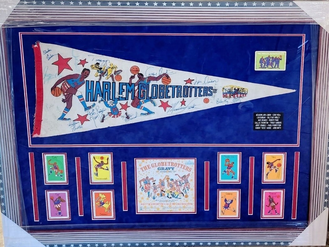 Harlem Globetrotters Autographed Framed Pennant 30x39 Beckett Authenticated: Harlem Globetrotters Autographed Framed Pennant 30x39 Beckett Authenticated Celebrate the legacy of the Harlem Globetrotters with this stunning signed and framed pennant. This original piece features 