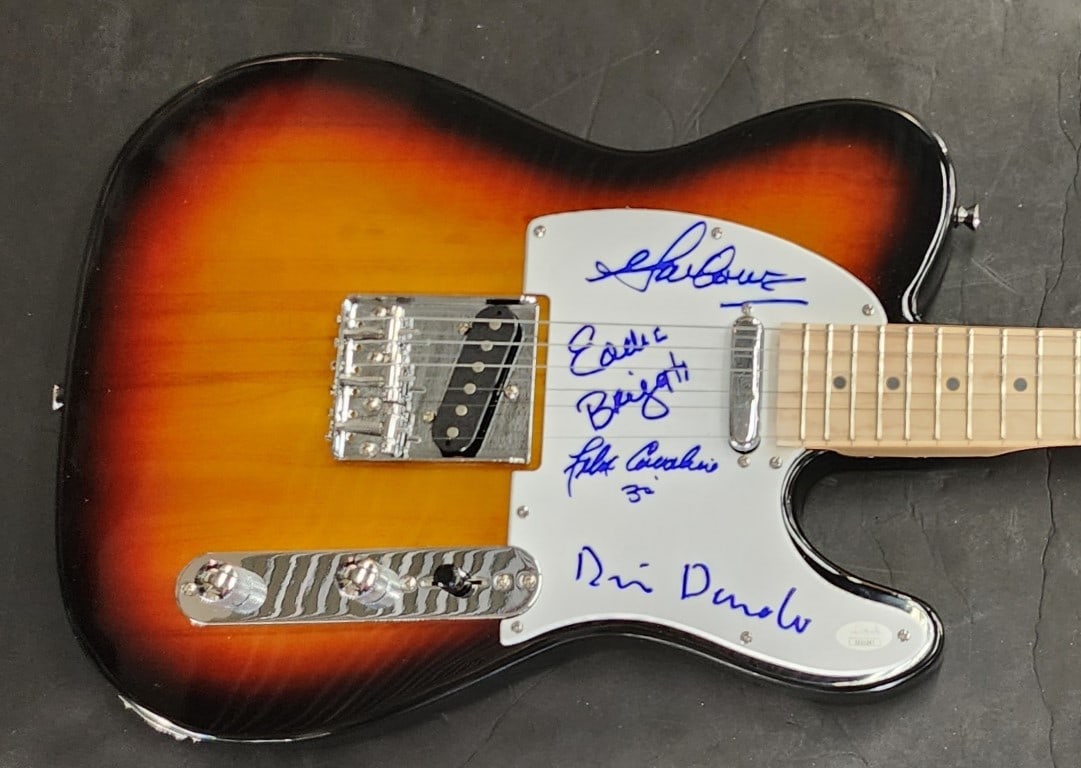 The Rascals signed electric guitar with pick JSA EE51247: The Rascals signed electric guitar with pick JSA EE51247 This is an original sunburst electric guitar and guitar pick, autographed by members of The Rascals. The autographs have been authenticated by 