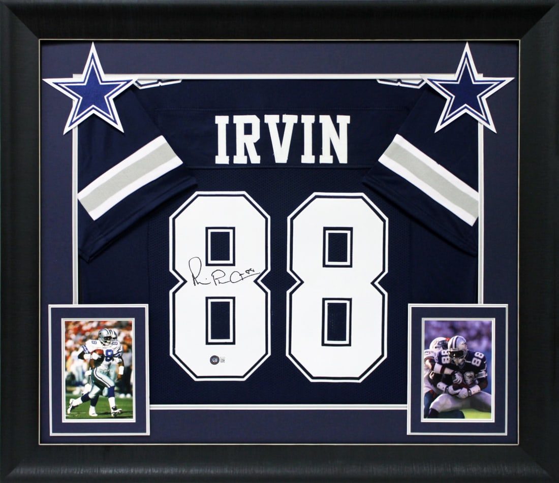 Framed Dallas Cowboys Jersey Signed by Michael Irvin with Beckett Authentication: Framed Dallas Cowboys Jersey Signed by Michael Irvin with Beckett Authentication This professionally framed navy blue pro style jersey features the authentic hand signature of Michael Irvin of the Dal