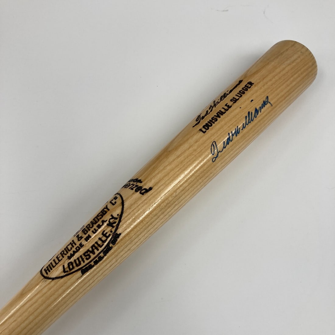 Ted Williams Signed W215 Game Model Bat with UDA Hologram: Ted Williams Signed W215 Game Model Bat with UDA Hologram This Ted Williams Signed Game Model Baseball Bat is a must-have for any baseball enthusiast. The bat features a 9/10 blue Sharpie signature fr