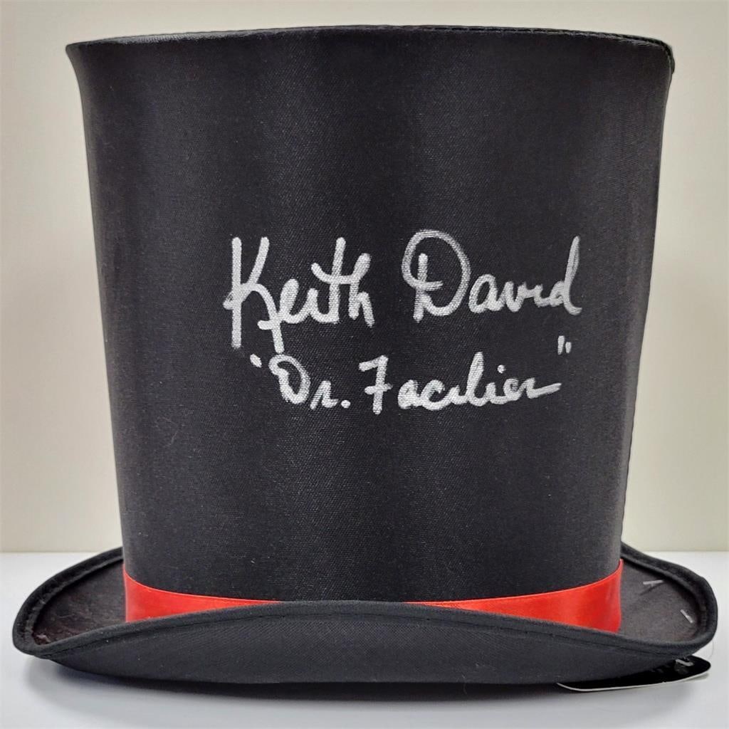Top Hat Signed by Keith David as Dr Facilier JSA Authenticated: Top Hat Signed by Keith David as Dr Facilier JSA Authenticated This is an original top hat signed by Keith David, known for voicing Dr. Facilier in the Disney movie Princess and the Frog. The autograp