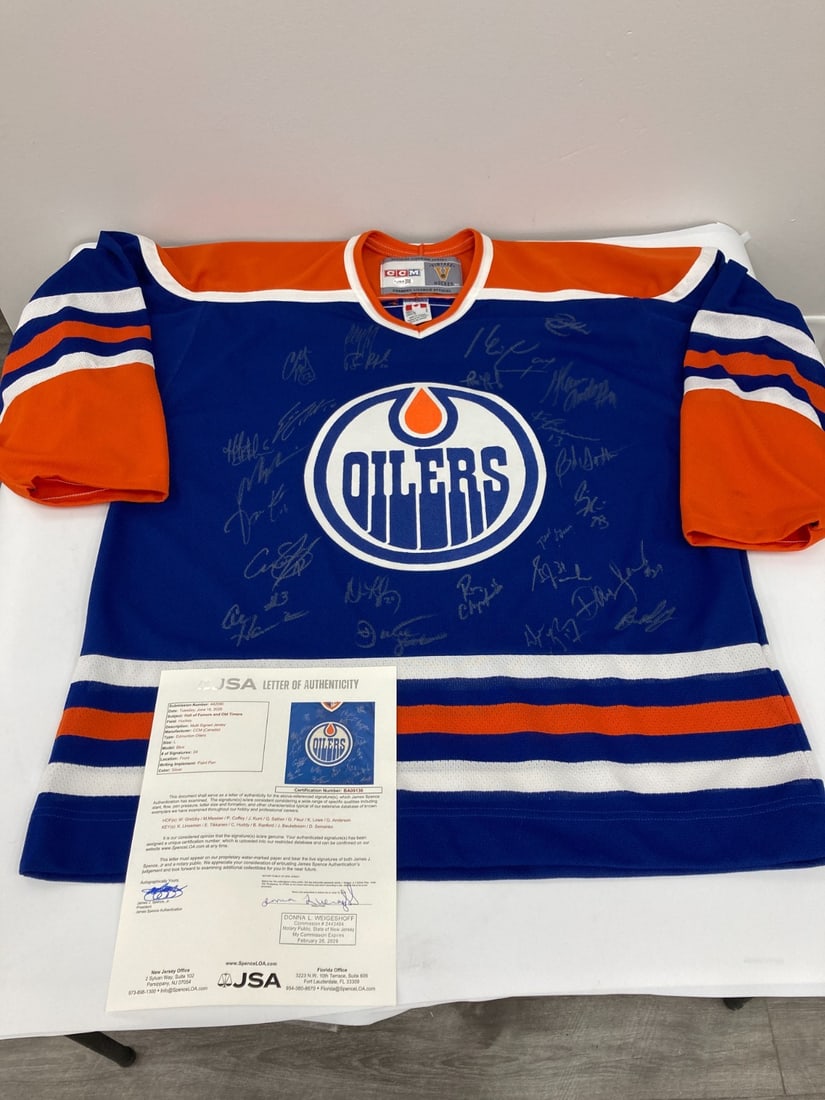 Edmonton Oilers Legends Jersey signed by 24 including Wayne Gretzky HOF JSA COA: Edmonton Oilers Legends Jersey signed by 24 including Wayne Gretzky HOF JSA COA This original Edmonton Oilers CCM "Vintage" jersey was signed by members of the team's MegaStars group and features a ta