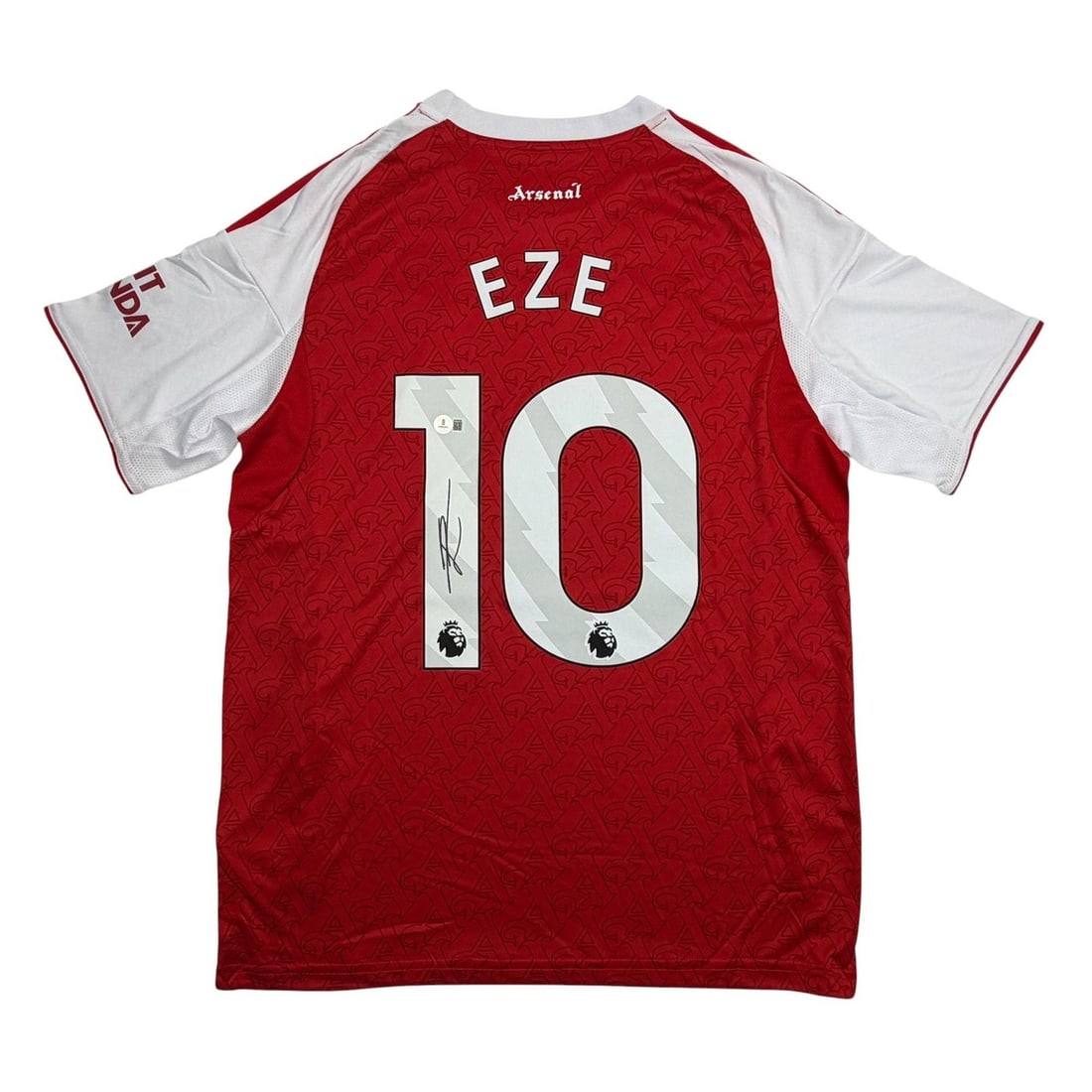Eberechi Eze Signed Red Arsenal Soccer Jersey Beckett BAS Authenticated: Eberechi Eze Signed Red Arsenal Soccer Jersey Beckett BAS Authenticated Pre-owned red soccer jersey signed by Eberechi Eze. This original jersey is authenticated by Beckett Grading Services and comes 