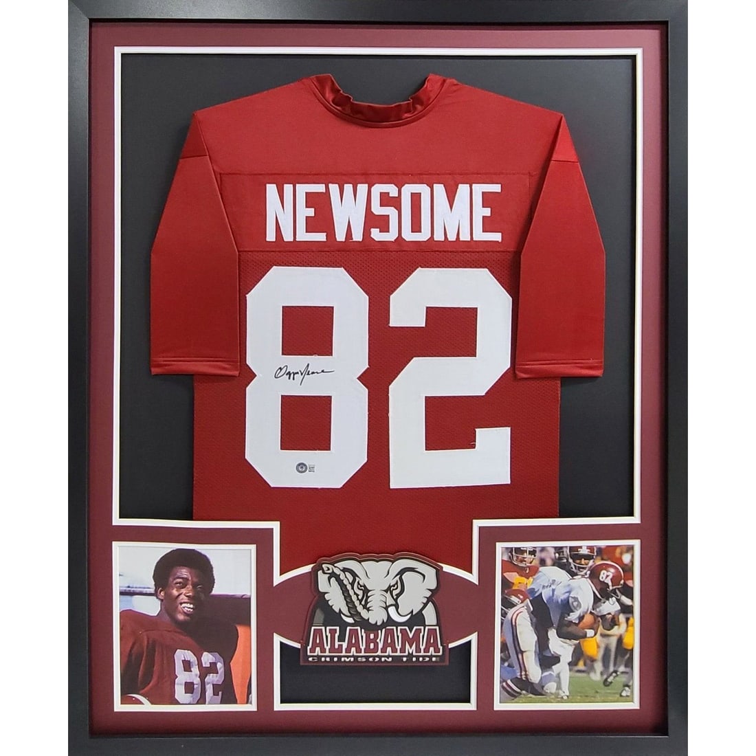 Framed Alabama Jersey Signed by Ozzie Newsome Beckett Authenticated: Framed Alabama Jersey Signed by Ozzie Newsome Beckett Authenticated This is a pre-owned framed Alabama jersey autographed by Ozzie Newsome. The jersey is authenticated by Beckett and features a tamper