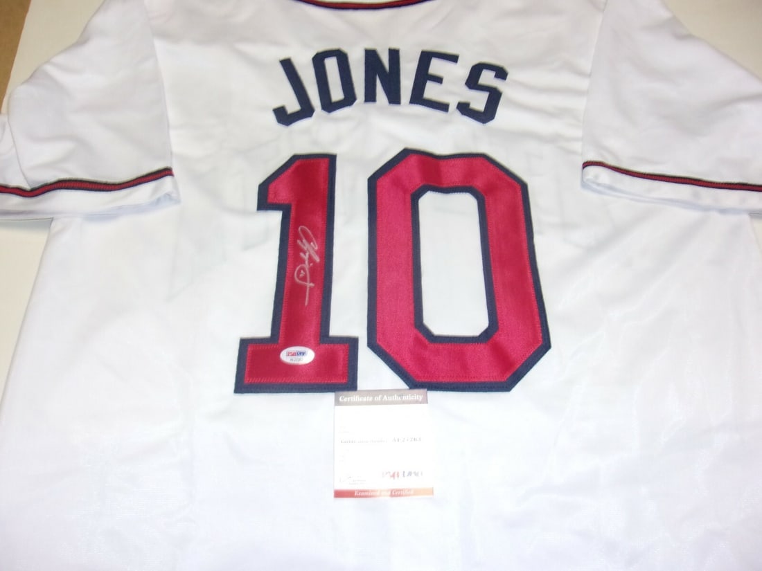 Signed Chipper Jones Atlanta Braves Jersey With PSA DNA Authentication: Signed Chipper Jones Atlanta Braves Jersey With PSA DNA Authentication This pre-owned Atlanta Braves jersey is signed by Chipper Jones, commemorating his achievements as the 1999 NL MVP and a member o