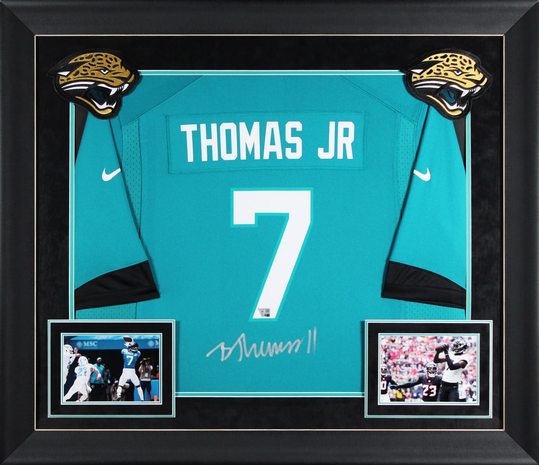 Brian Thomas Jr. Signed Teal Nike Jersey Display Jacksonville Jaguars: Brian Thomas Jr. Signed Teal Nike Jersey Display Jacksonville Jaguars This stunning framed display features a teal Nike game jersey personally signed by Brian Thomas Jr. of the Jacksonville Jaguars. T