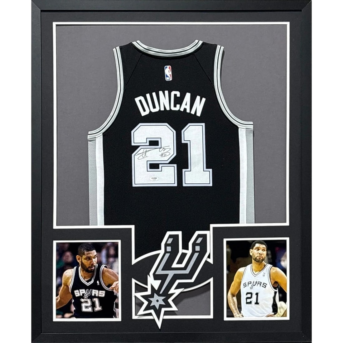 Framed Tim Duncan Autographed Spurs Jersey with PSA DNA Authentication: Framed Tim Duncan Autographed Spurs Jersey with PSA DNA Authentication This framed black San Antonio Spurs jersey is hand-signed by Tim Duncan. The autographed jersey is authenticated by PSA/DNA and i