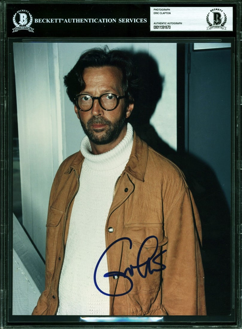 Eric Clapton Signed 8x10 Photo Authenticated by Beckett: Eric Clapton Signed 8x10 Photo Authenticated by Beckett This is an authentic 8x10 photograph personally signed by the legendary Eric Clapton. The item is certified by Beckett Authentication Services (