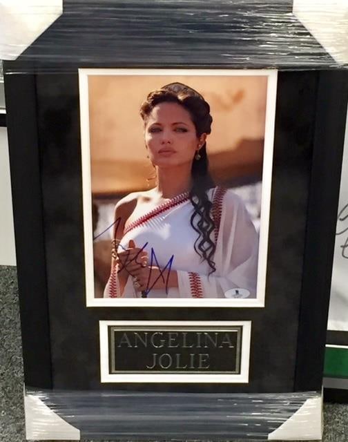 Beckett Authenticated Angelina Jolie Signed Framed 8x10 Alexander Photograph: Beckett Authenticated Angelina Jolie Signed Framed 8x10 Alexander Photograph This is an original 8x10 photograph from the film Alexander, professionally framed and hand-signed by Angelina Jolie. The a