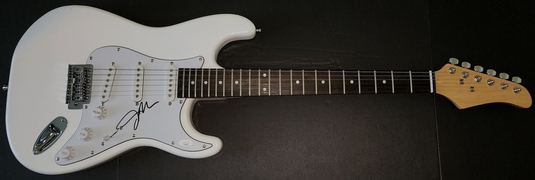 Janelle Monae Signed Electric Guitar Authenticated by JSA: Janelle Monae Signed Electric Guitar Authenticated by JSA This is a pre-owned electric guitar autographed by the talented Janelle Monae. The autograph is authenticated by James Spence Authentication (