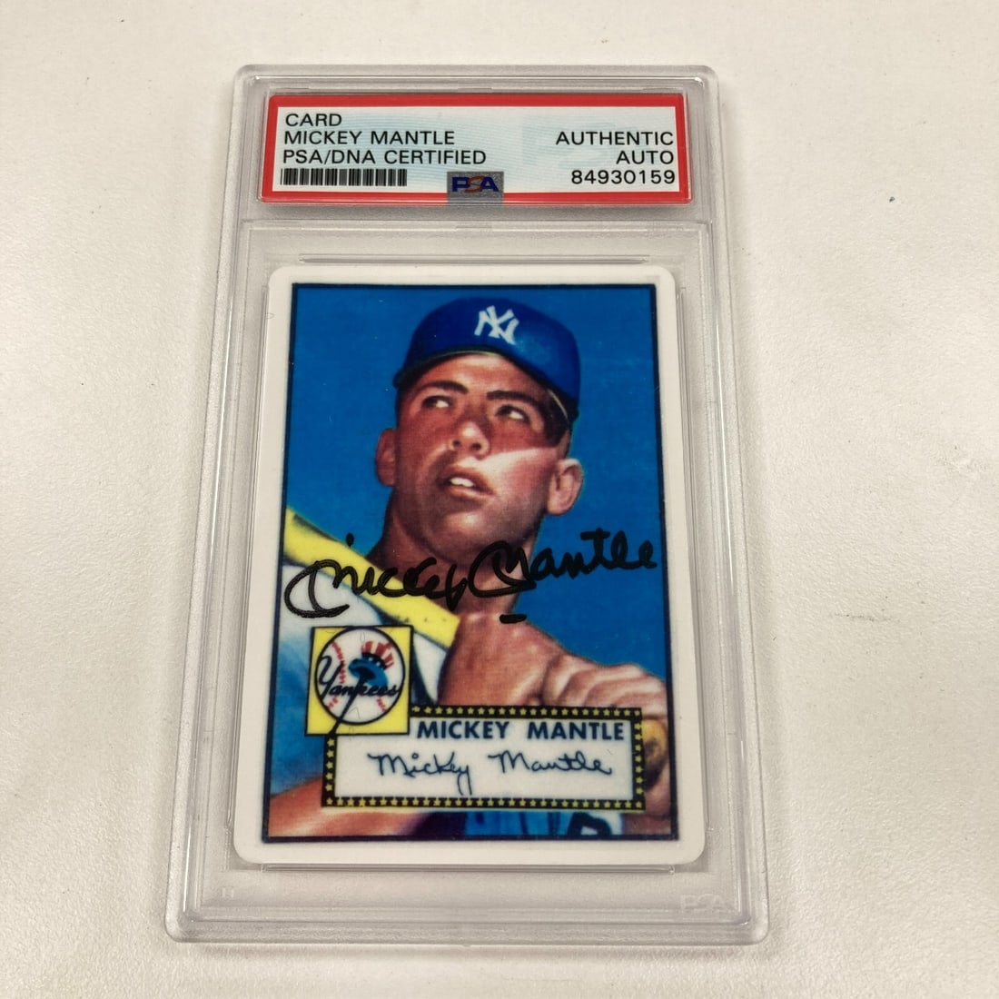 1952 Topps Mickey Mantle Signed Baseball Card PSA Certified: 1952 Topps Mickey Mantle Signed Baseball Card PSA Certified This 1952 Topps Mickey Mantle Signed Porcelain Baseball Card is a remarkable collectible for any baseball enthusiast. The card features the 