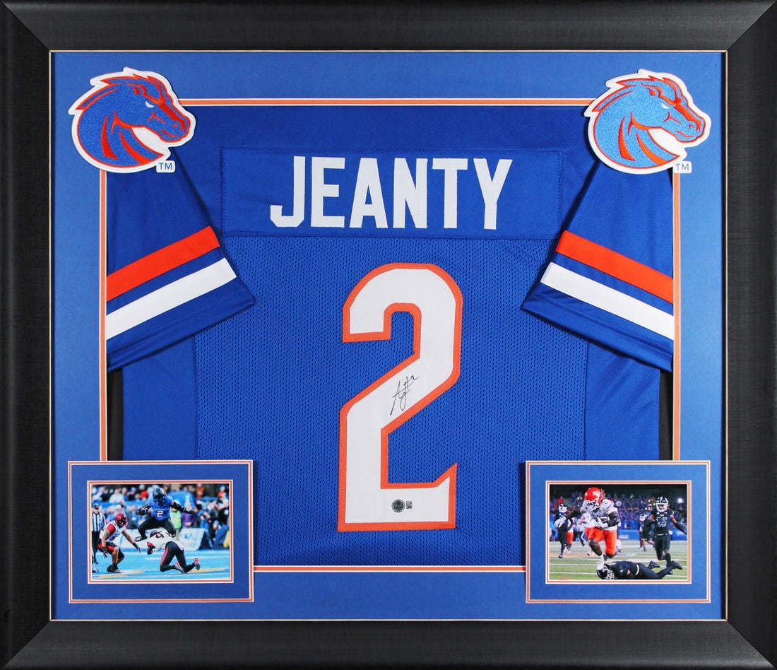 Framed Blue Jersey Signed by Ashton Jeanty Beckett Witnessed Boise State Broncos: Framed Blue Jersey Signed by Ashton Jeanty Beckett Witnessed Boise State Broncos This professionally framed blue Pro Style jersey is personally signed by Ashton Jeanty of the Boise State Broncos. The 