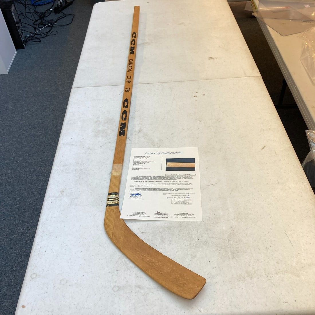 CCM Team Canada 1976 Canada Cup hockey stick signed by 24 with Bobby Orr JSA COA: CCM Team Canada 1976 Canada Cup hockey stick signed by 24 with Bobby Orr JSA COA Original CCM hockey stick from the 1976 Canada Cup, game issued during Bobby Orr's time with Team Canada and signed by 