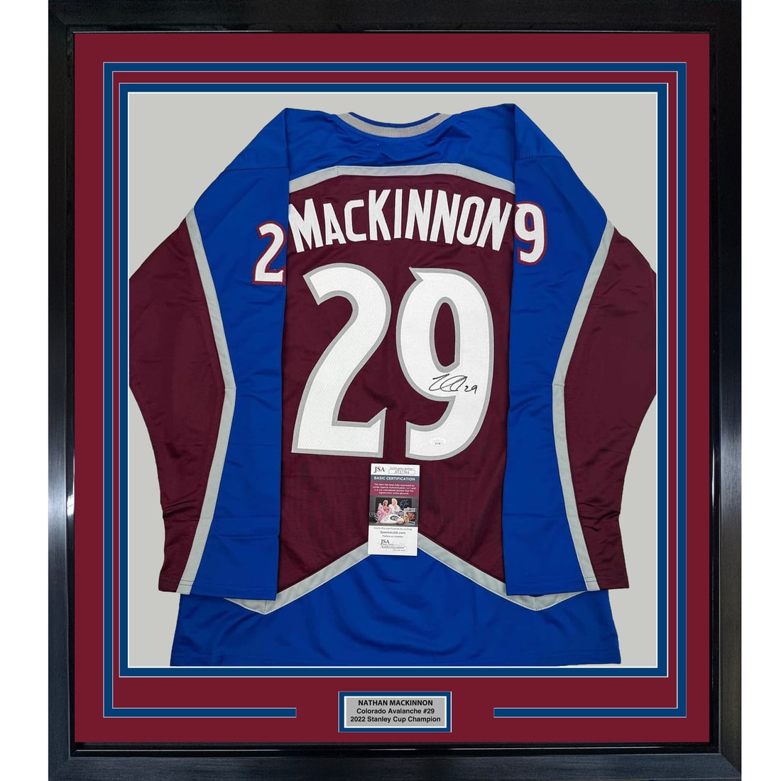 Nathan MacKinnon signed Colorado Avalanche maroon jersey framed 35x39 JSA COA: Nathan MacKinnon signed Colorado Avalanche maroon jersey framed 35x39 JSA COA This framed display features a Colorado Avalanche maroon jersey autographed by Nathan MacKinnon. The jersey is professiona