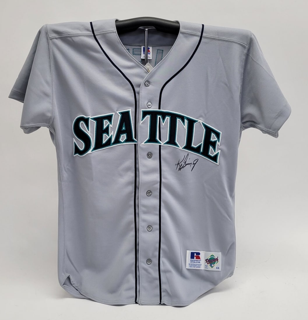 Ken Griffey Jr Signed Authentic Seattle Mariners Jersey Beckett Authenticated: Ken Griffey Jr Signed Authentic Seattle Mariners Jersey Beckett Authenticated This authentic 1990's Seattle Mariners game model jersey is signed by Hall of Fame slugger Ken Griffey Jr. The autograph i