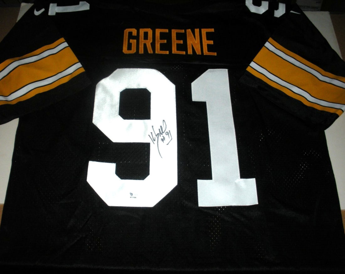 Kevin Greene Signed Pittsburgh Steelers Nike Jersey with GAI COA: Kevin Greene Signed Pittsburgh Steelers Nike Jersey with GAI COA This officially licensed Nike jersey features Kevin Greene, a renowned player of the Pittsburgh Steelers. The jersey is an original pie
