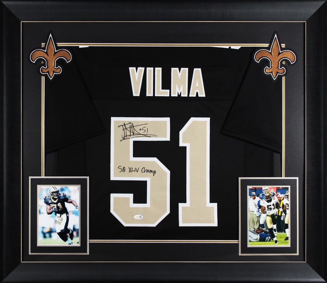 Framed Jonathan Vilma Signed Saints Jersey SB XLIV Champ JSA Witness: Framed Jonathan Vilma Signed Saints Jersey SB XLIV Champ JSA Witness Autographed black pro style framed jersey signed by Jonathan Vilma of the New Orleans Saints, featuring the inscription "SB XLIV Ch