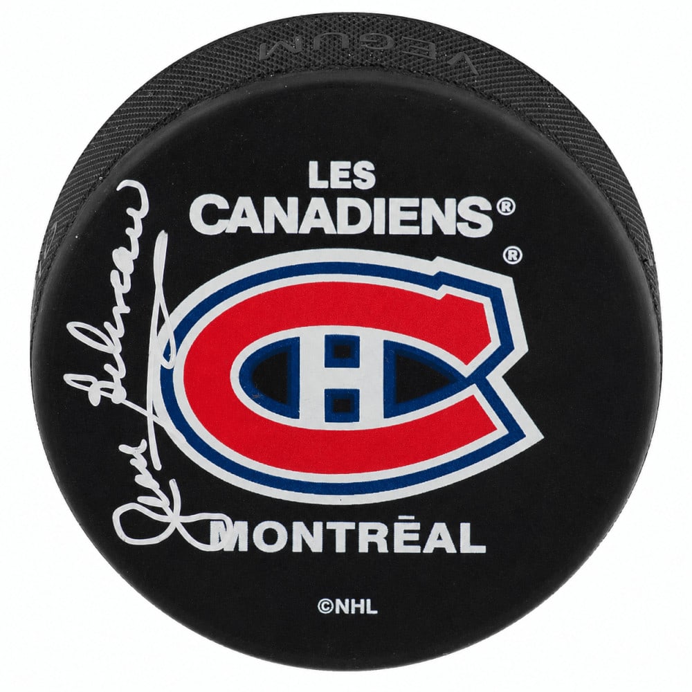 PSA Jean Beliveau Autographed Montreal Canadiens Logo Hockey Puck: PSA Jean Beliveau Autographed Montreal Canadiens Logo Hockey Puck Official Montreal Canadiens (Les Canadiens) logo hockey puck signed by Jean Beliveau. This original autographed puck is a pre-owned pi