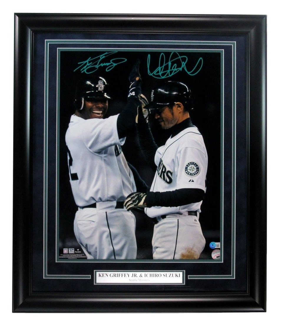 Framed 16x20 Mariners Photo Signed by Ken Griffey Jr and Ichiro Suzuki: Framed 16x20 Mariners Photo Signed by Ken Griffey Jr and Ichiro Suzuki Framed Seattle Mariners photo signed by Ken Griffey Jr. and Ichiro Suzuki. This original 16x20 baseball photo is authenticated by