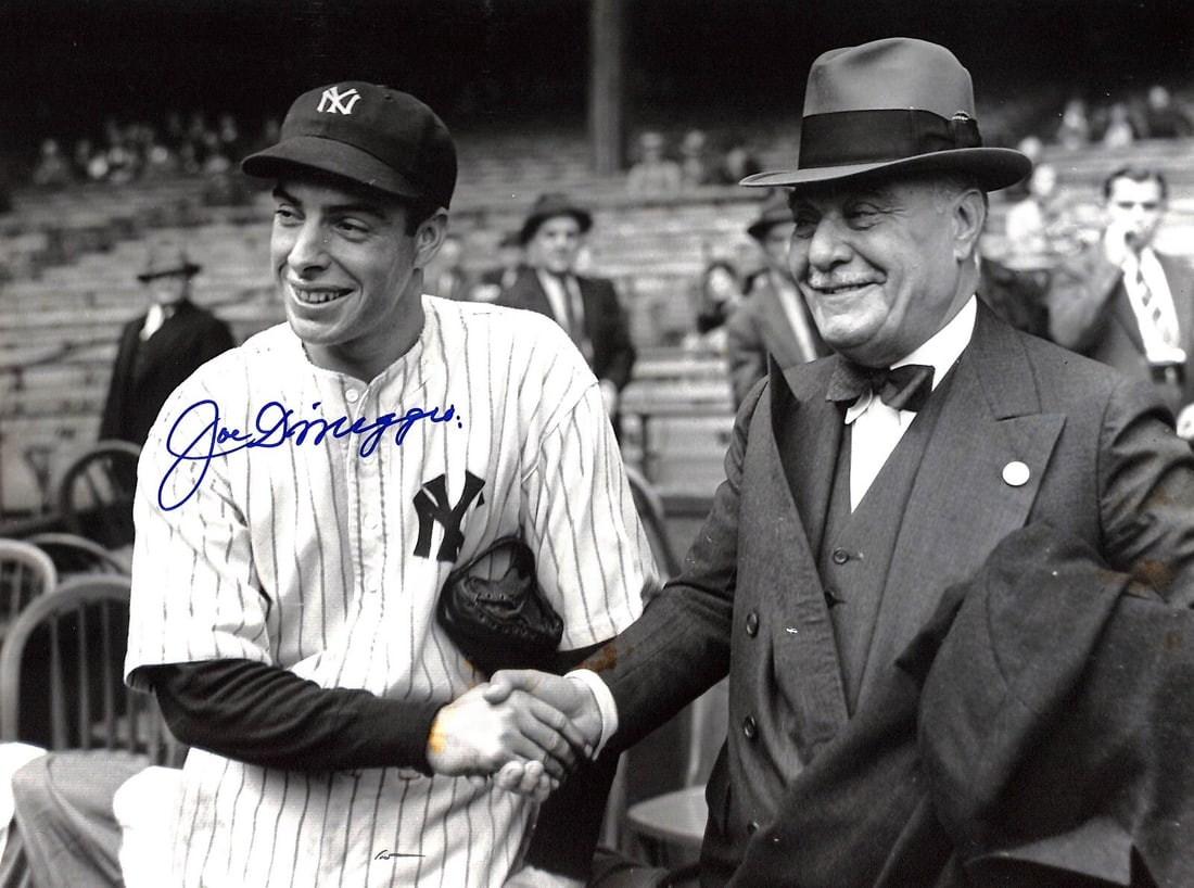 Joe DiMaggio Autographed 11x14 Photo JSA New York Yankees: Joe DiMaggio Autographed 11x14 Photo JSA New York Yankees This is an original 11x14 photo of baseball legend Joe DiMaggio, featuring his authentic signature. The photograph captures DiMaggio in action