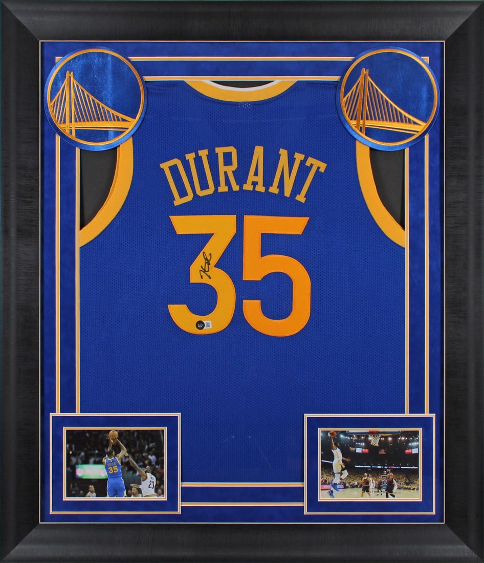 Kevin Durant Signed Blue Pro Style Framed Jersey BAS Witnessed: Kevin Durant Signed Blue Pro Style Framed Jersey BAS Witnessed This authentic blue pro style framed jersey has been personally signed by Kevin Durant, the star player of the Golden State Warriors. Fea