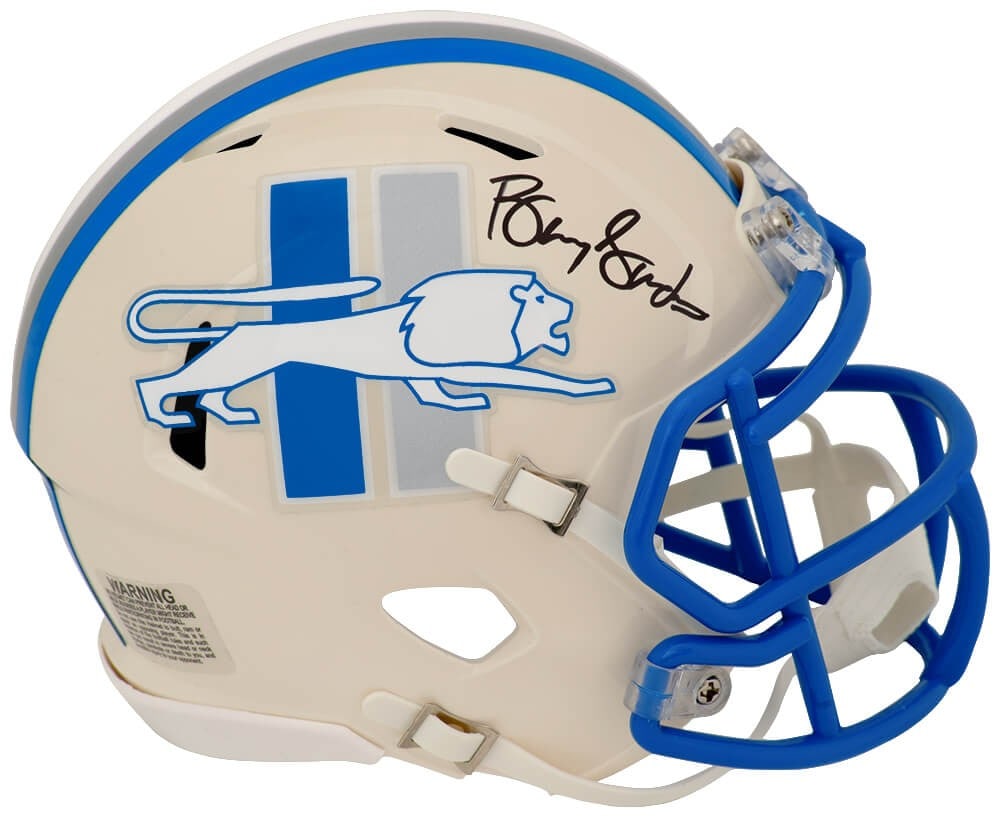 Riddell Speed mini helmet Barry Sanders Lions black signed with COA: Riddell Speed mini helmet Barry Sanders Lions black signed with COA This is a Detroit Lions Retro Riddell Speed mini helmet signed by Barry Sanders. The helmet features a black design and includes a t
