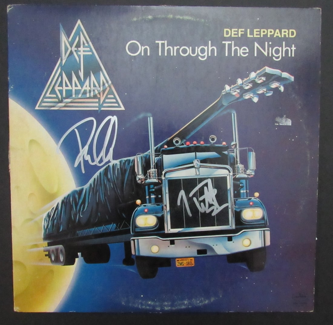 Def Leppard Dual-Signed Album On Through the Night JSA Certified: Def Leppard Dual-Signed Album On Through the Night JSA Certified This is an original album titled "On Through the Night" by Def Leppard, featuring dual signatures from band members Joe Elliott and Phi