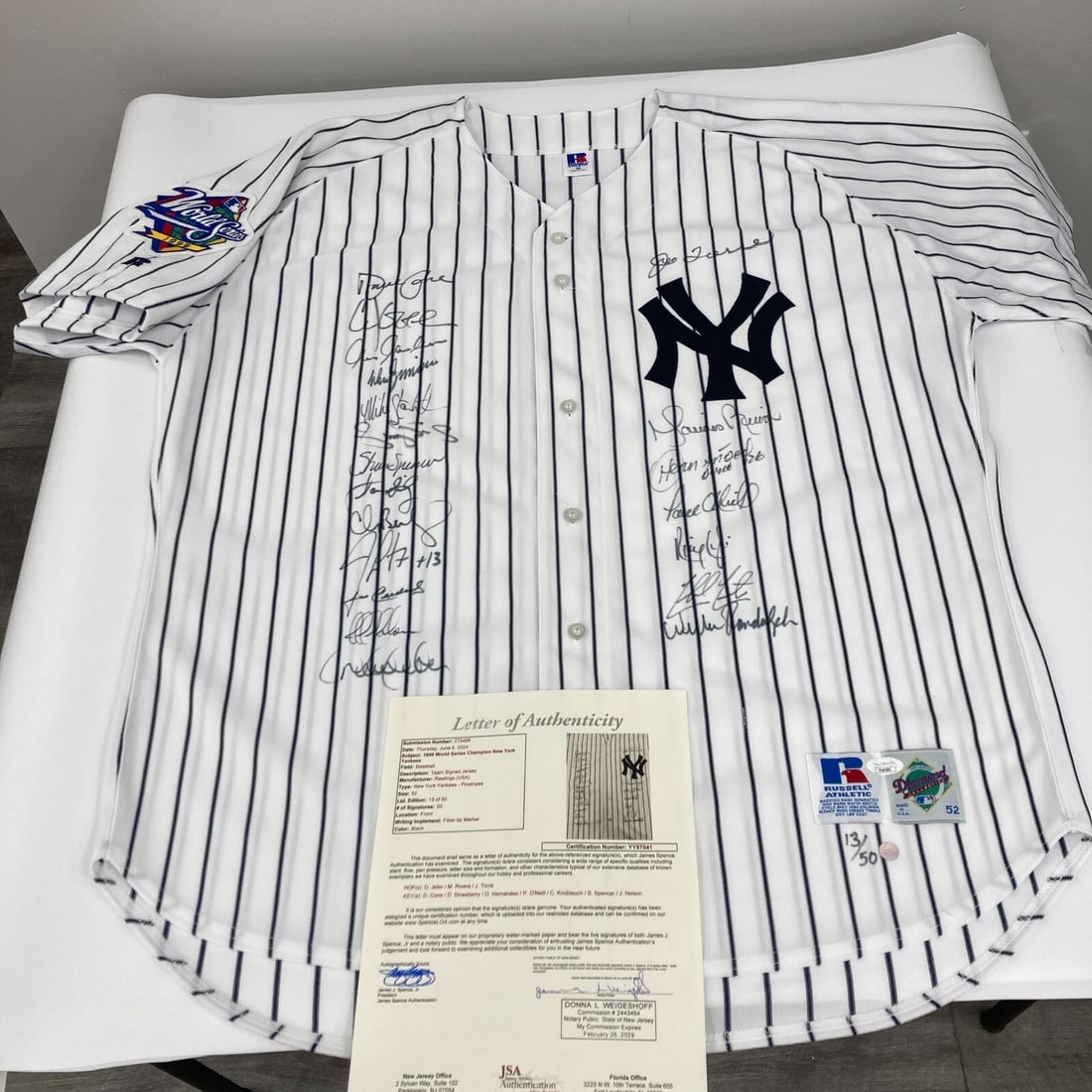 1999 New York Yankees Team Signed Jersey Derek Jeter JSA Authenticated: 1999 New York Yankees Team Signed Jersey Derek Jeter JSA Authenticated This is a 1999 New York Yankees Team Signed World Series Jersey featuring iconic players including Derek Jeter, Mariano Rivera, a