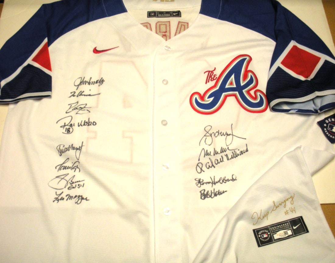Official Nike baseball jersey signed by Glavine Smoltz and Horner JSA COA: Official Nike baseball jersey signed by Glavine Smoltz and Horner JSA COA This official licensed Nike jersey has been signed by Tom Glavine, John Smoltz, and Bob Horner. It is an original item from Ma