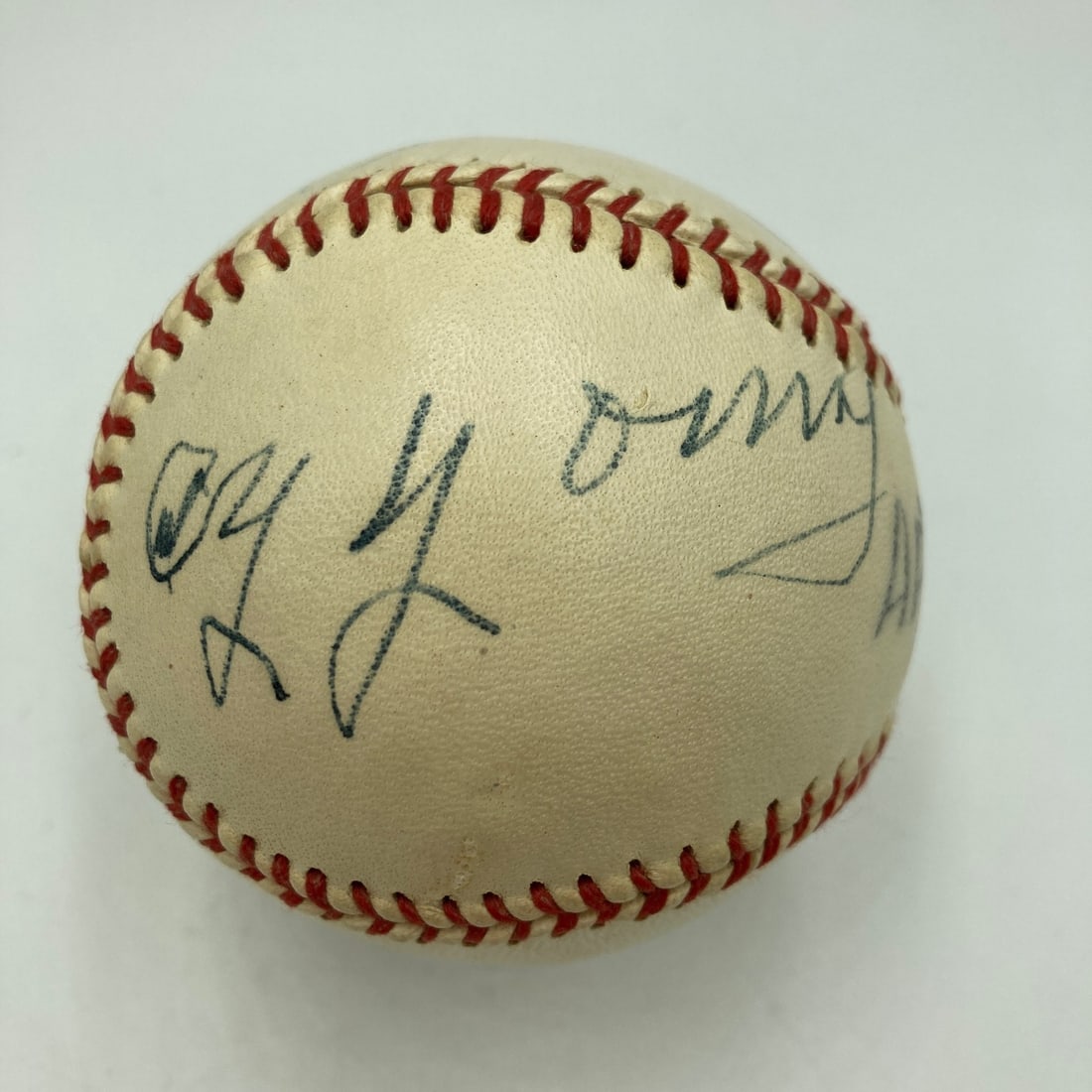 Cy Young Autographed Baseball JSA COA: Cy Young Autographed Baseball JSA COA This is an original baseball signed by Cy Young, a legendary figure in the sport, with a bold signature on his own panel. The baseball also features the signature