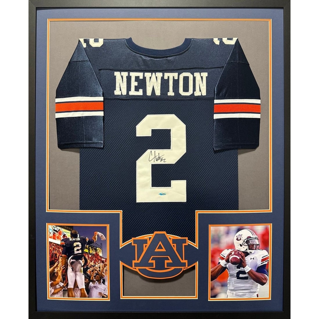 Cam Newton Autographed Framed Jersey with Upper Deck COA: Cam Newton Autographed Framed Jersey with Upper Deck COA Celebrate the legacy of Cam Newton with this stunning framed jersey, expertly autographed and authenticated by Upper Deck, a leader in sports m