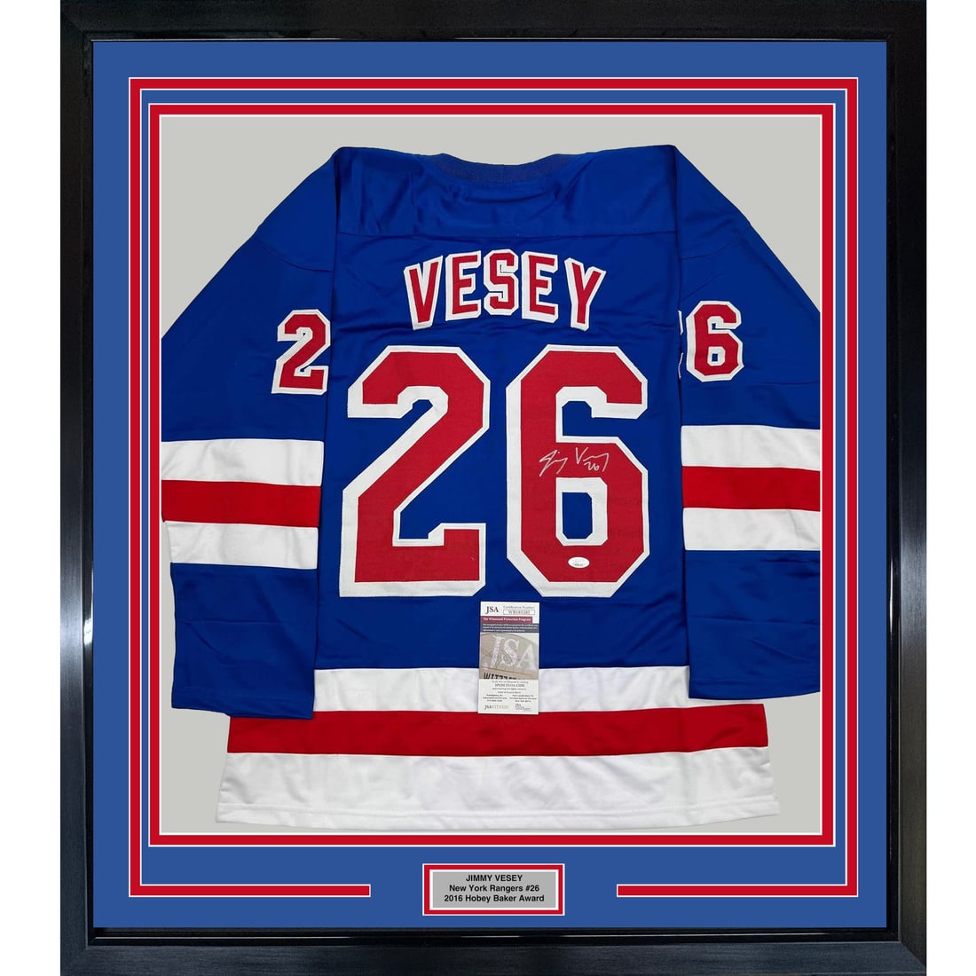 Framed Autographed Jimmy Vesey New York Rangers Jersey with JSA COA: Framed Autographed Jimmy Vesey New York Rangers Jersey with JSA COA This professionally framed autographed Jimmy Vesey New York Rangers hockey jersey is a must-have for any fan. The jersey, measuring 